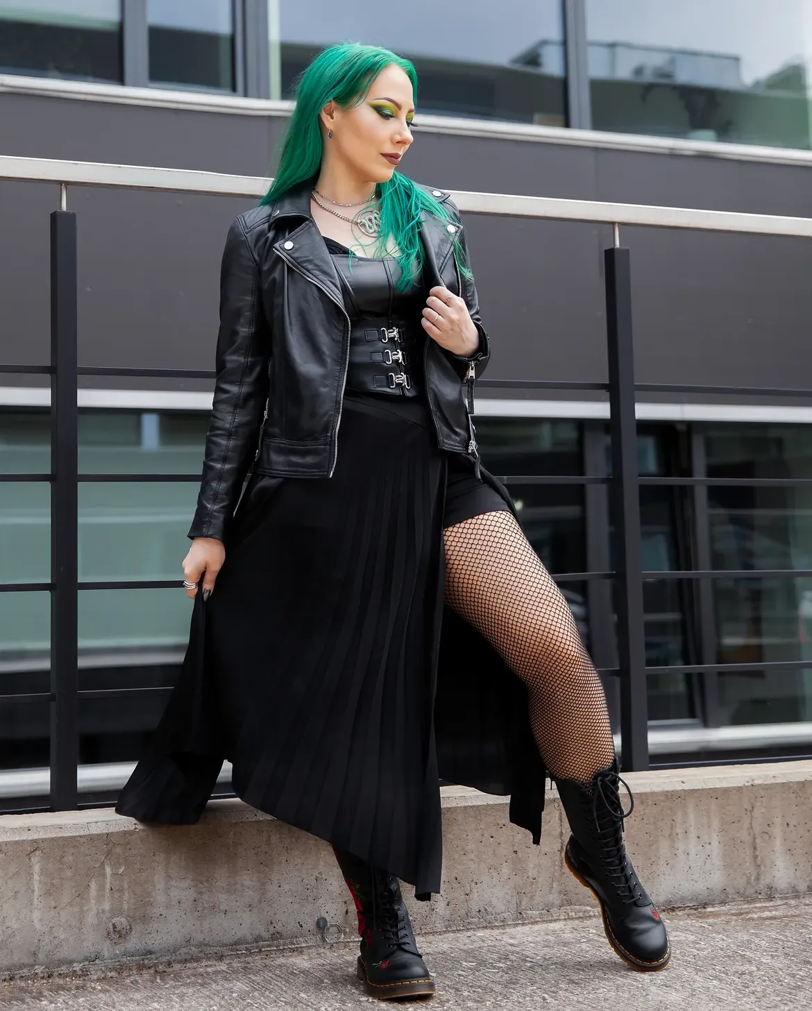 Black Leather Jacket With Pleated Skirt Look