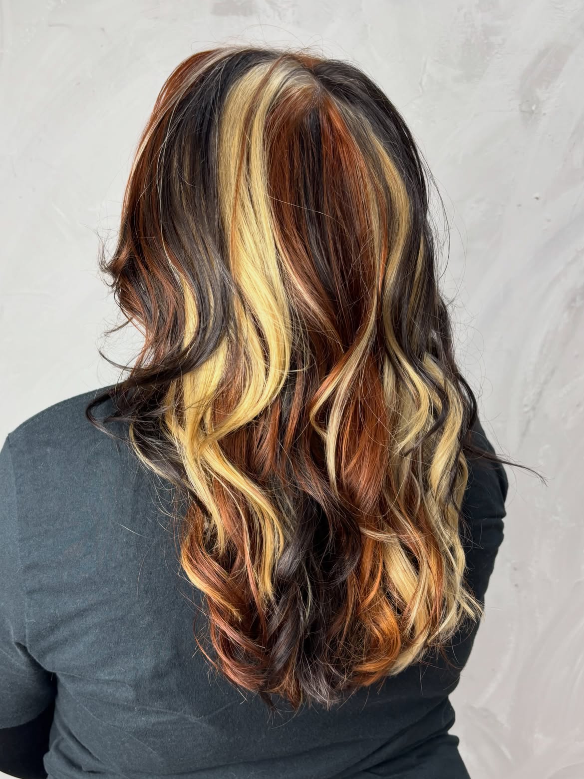 Bold Calico Hair Color With Loose Waves