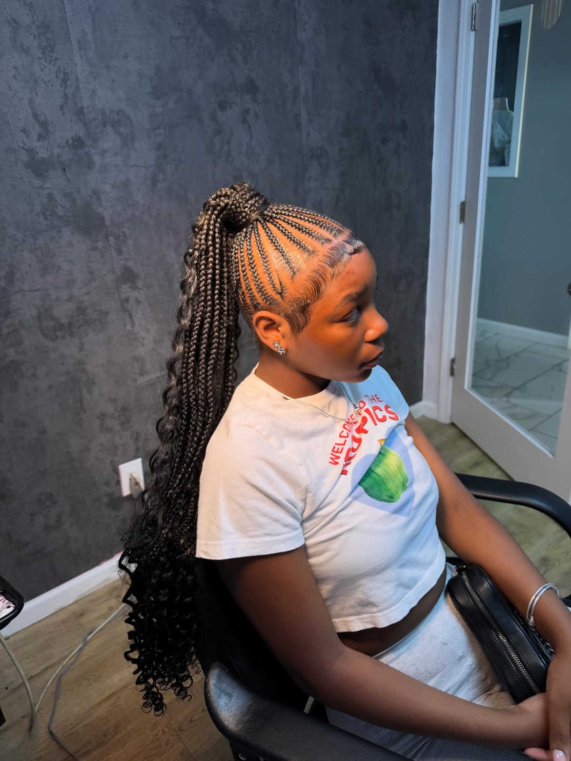 Braided High Ponytail With Added Curls