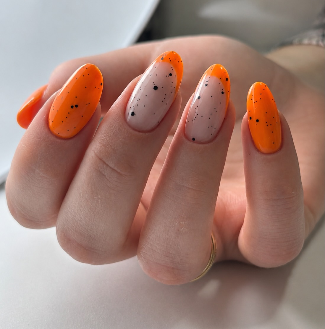 Bright Orange French Tip with Speckle Detail