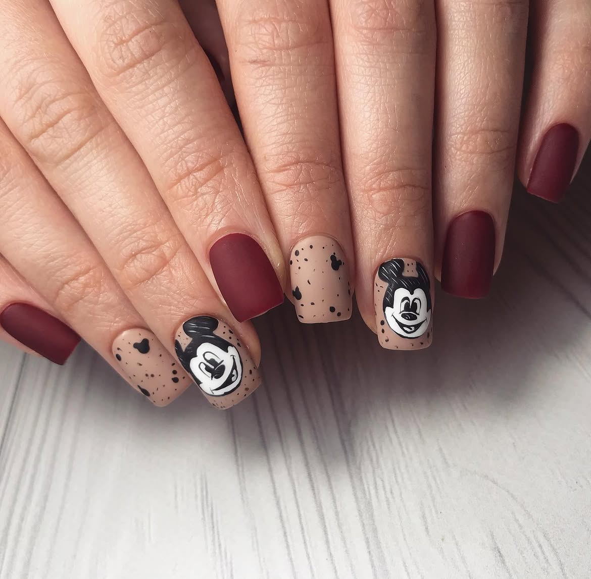 Burgundy Matte Nails with Mickey Mouse Accents