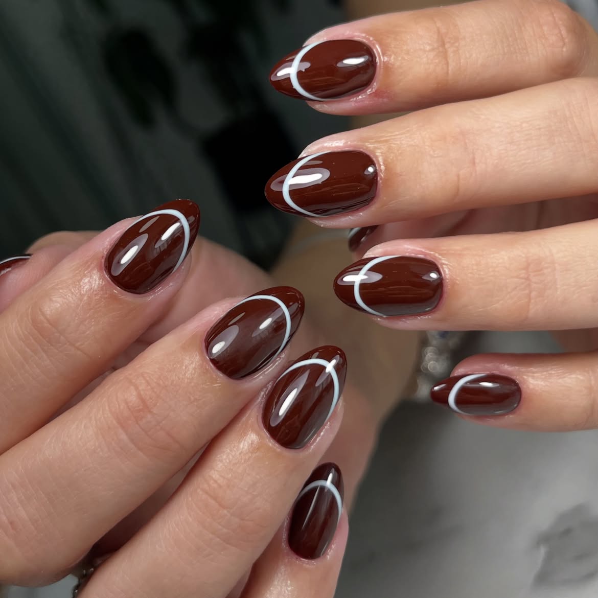 Chocolate Football Stitch Almond Nails