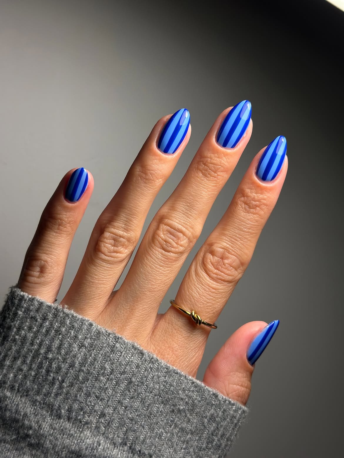 Concentric Blue Stripe Almond Nails