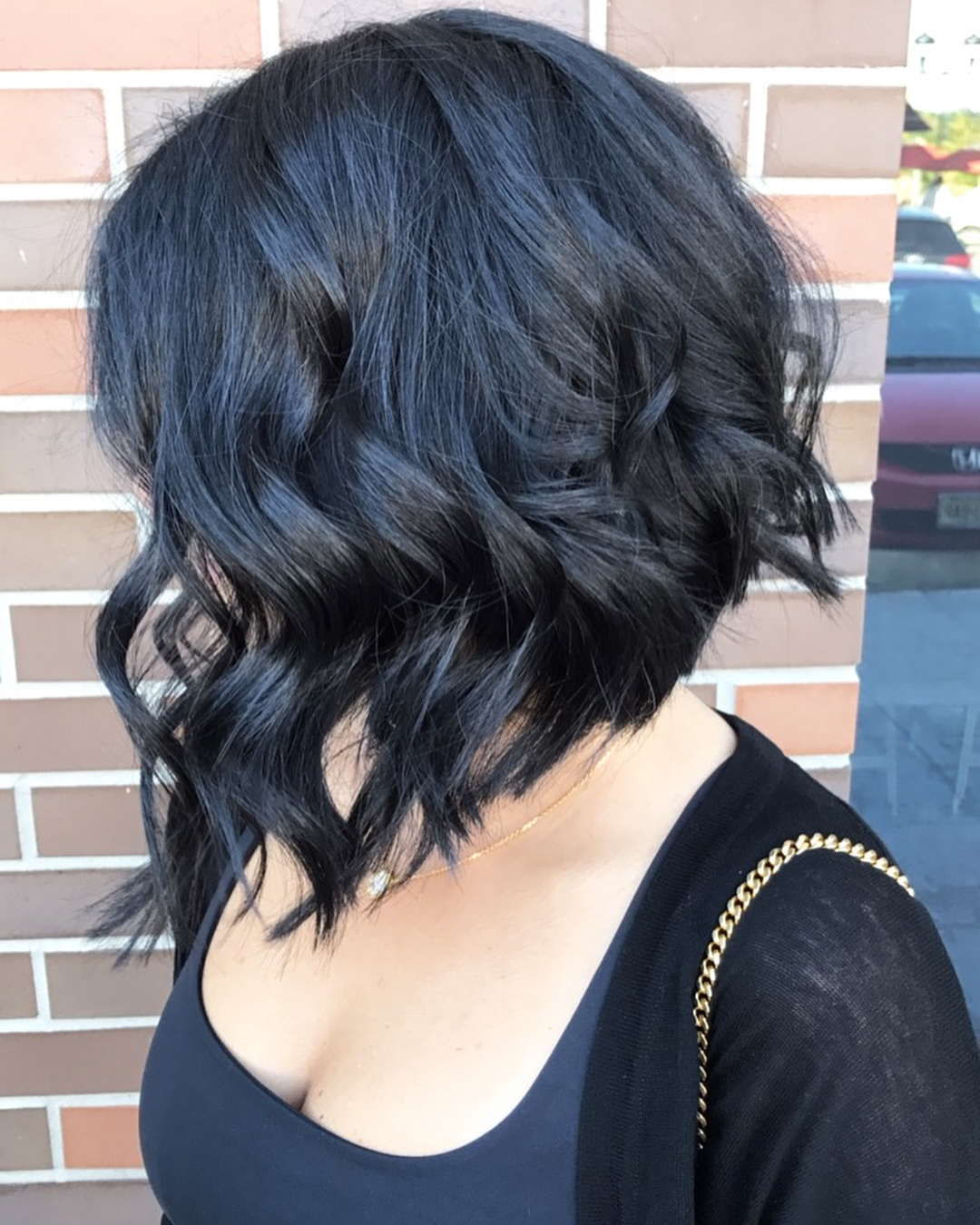 Deep Black Wavy Collarbone Bob With Subtle Layers