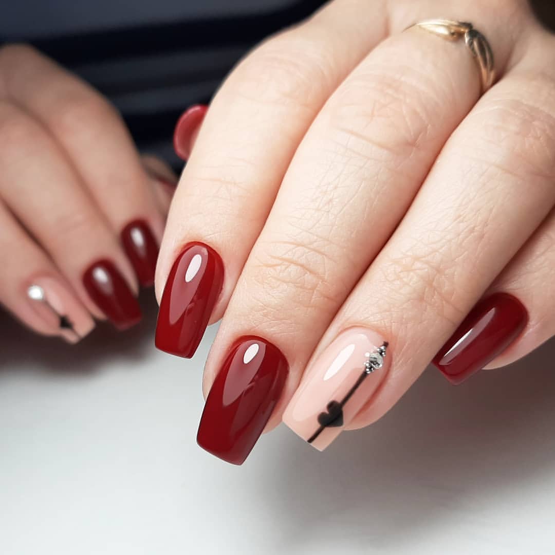 Deep Burgundy Glossy Nails with Minimalist Heart Art