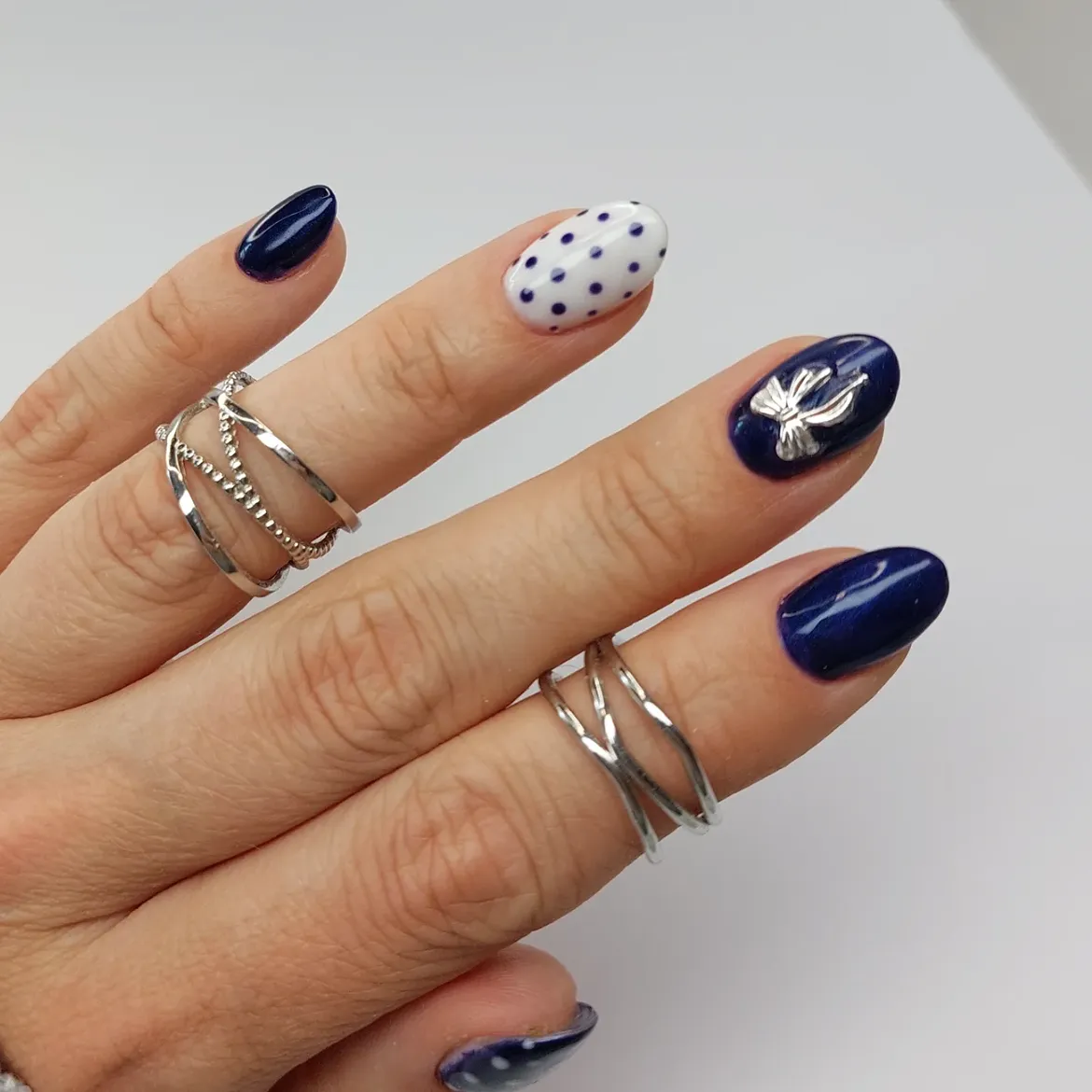 Deep Navy and White Polka Dot Oval Nails