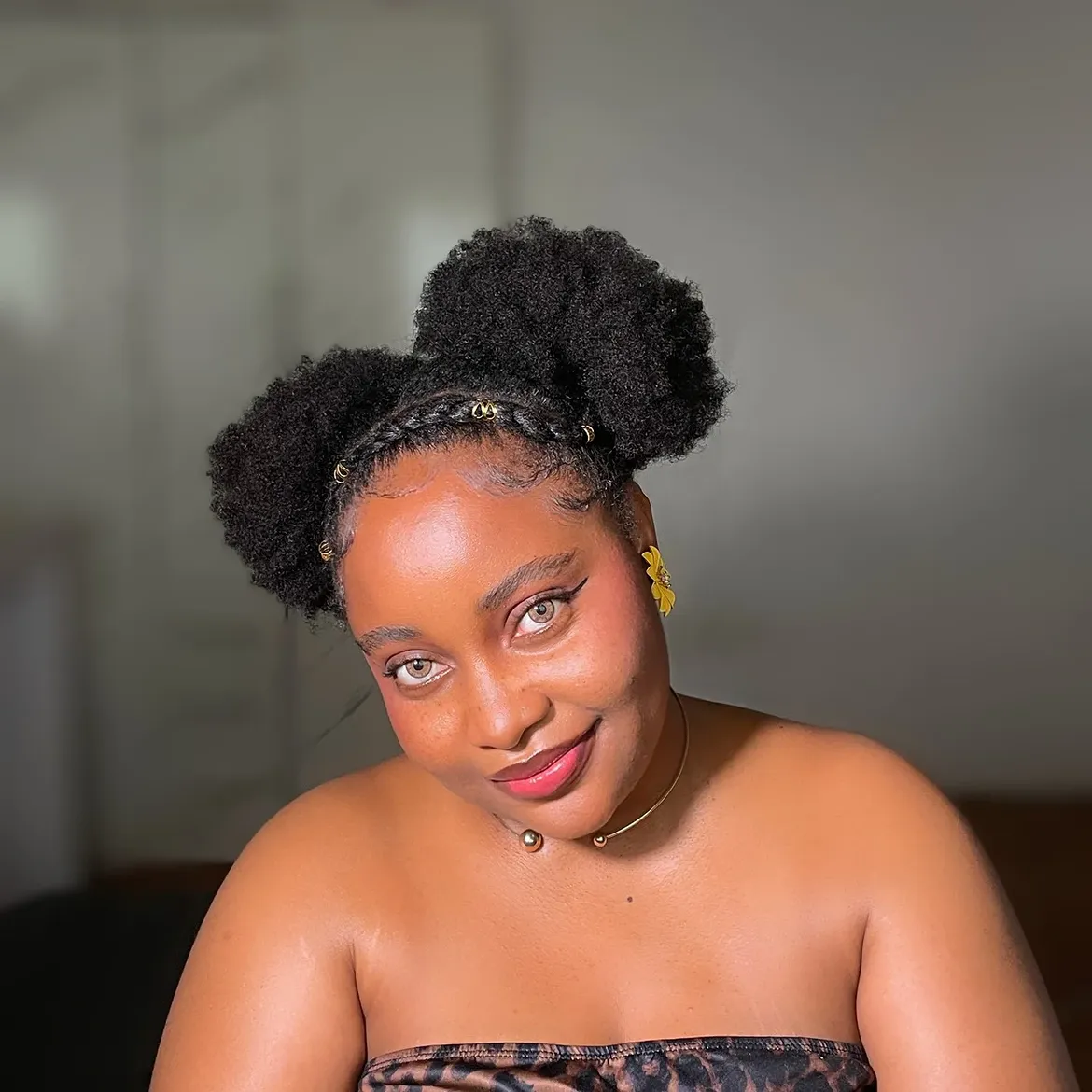 Double Space Buns With Braided Accents