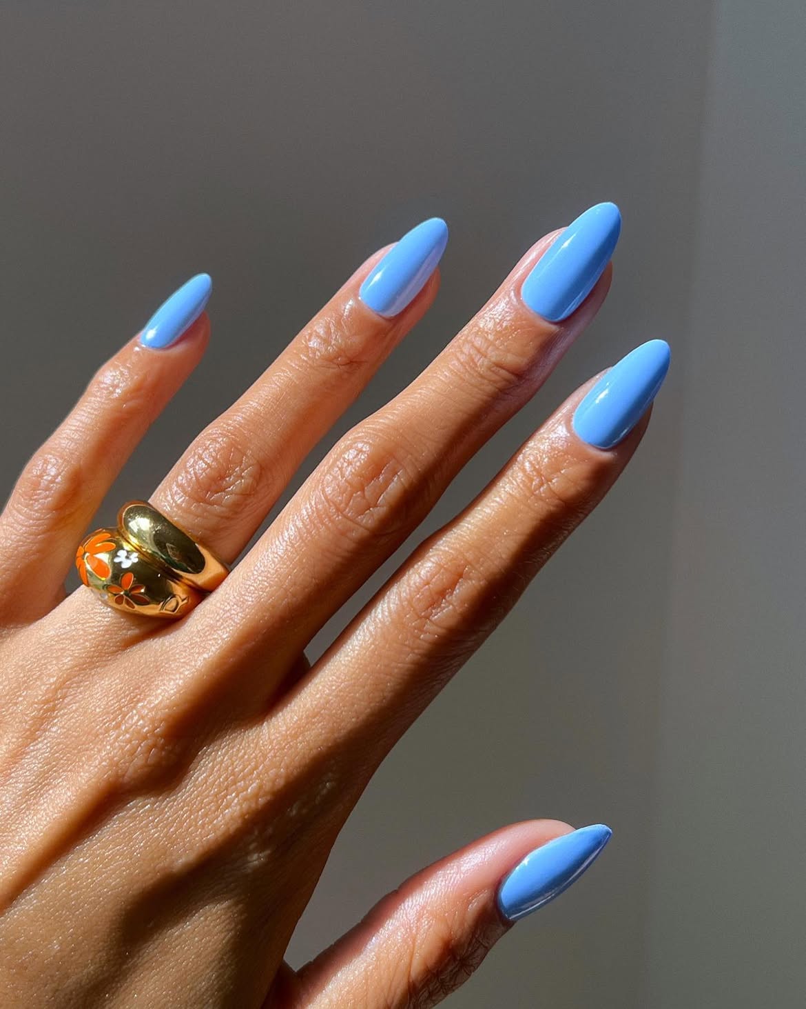 Glossy Periwinkle Almond Shaped Nails