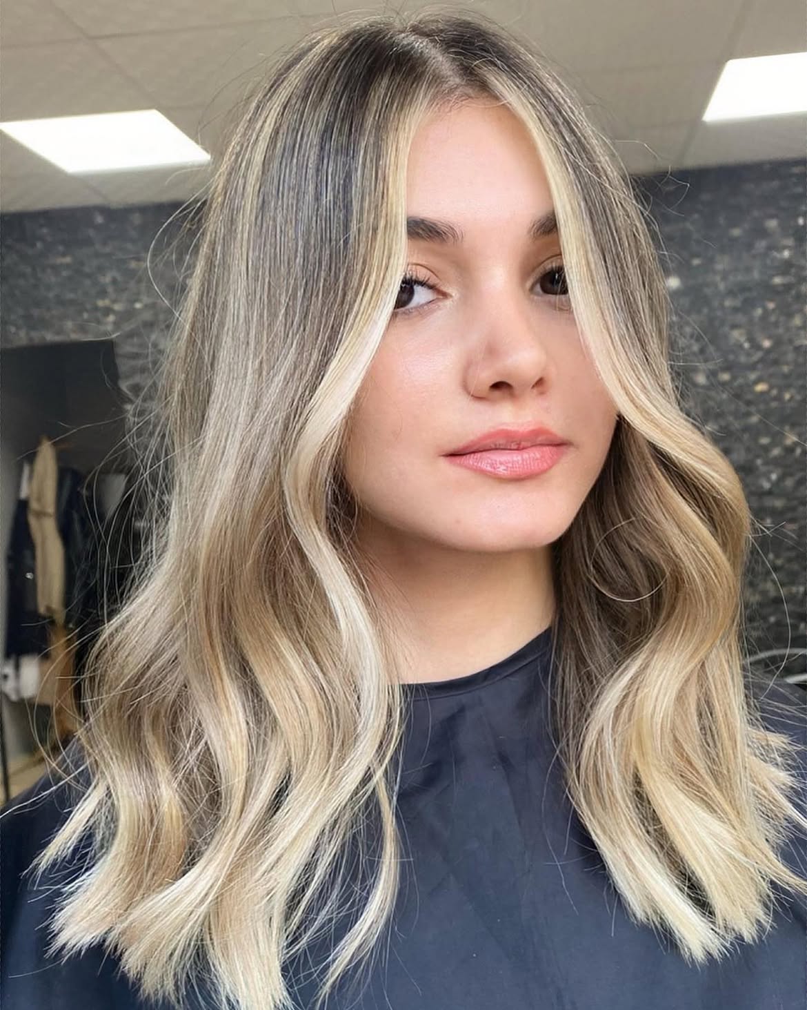Glowy Blonde Waves with Face Framing Layers