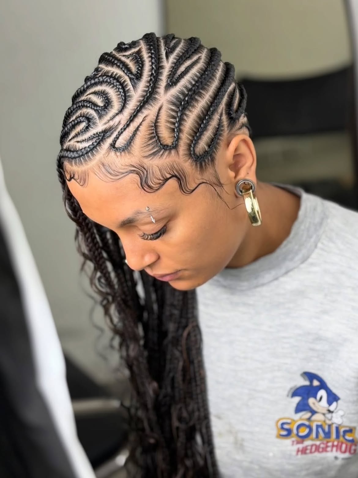 Intricate Cornrow Braids With Curly Ends