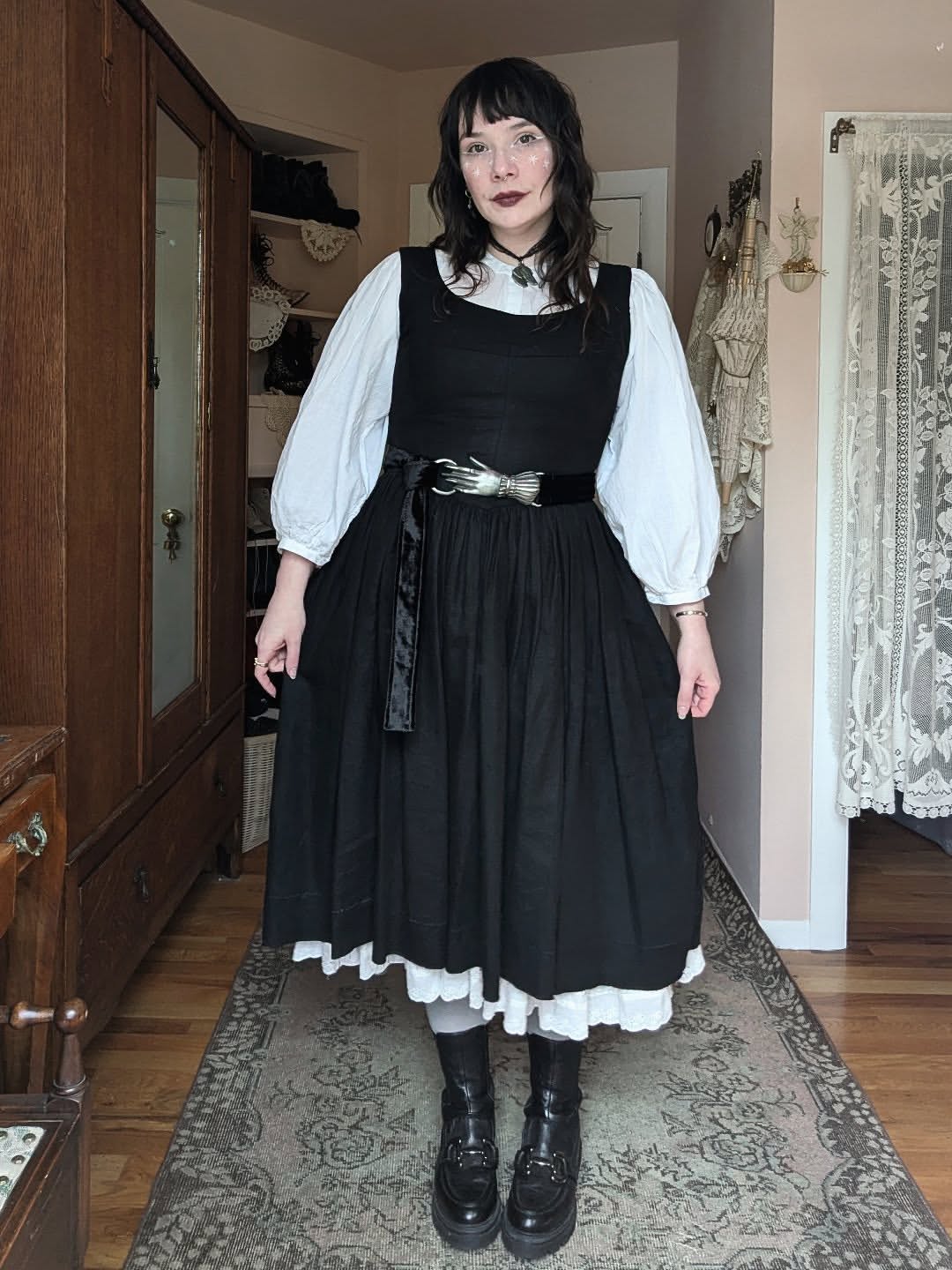 Layered Black Pinafore With White Blouse