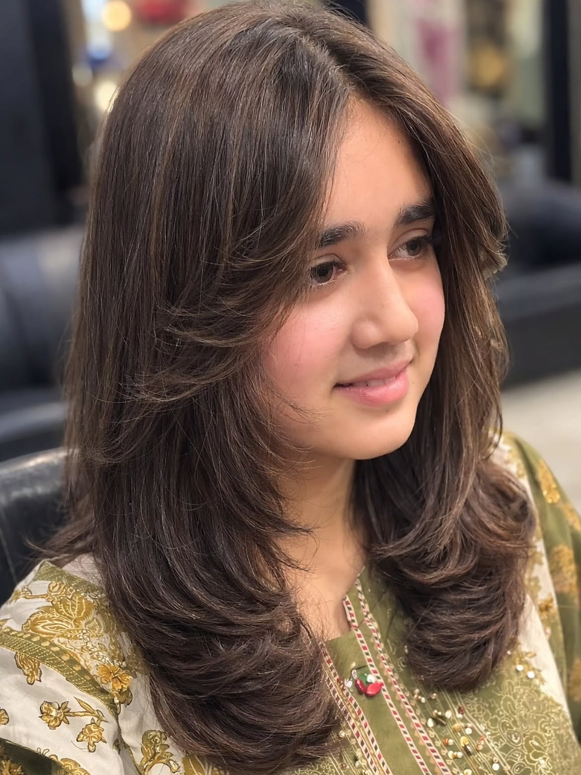 Layered Collarbone Cut With Subtle Face Framing