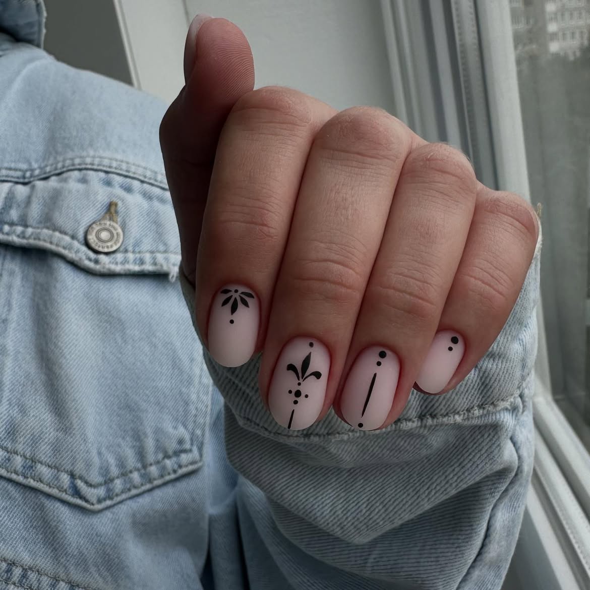 Matte Nude Nails with Delicate Black Line Art