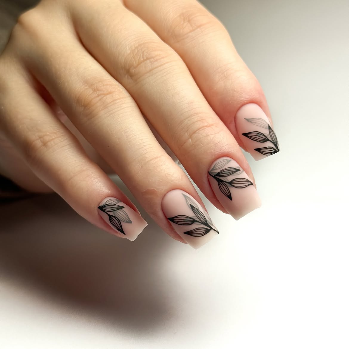 Matte Nude Square Nails With Black Leaf Art