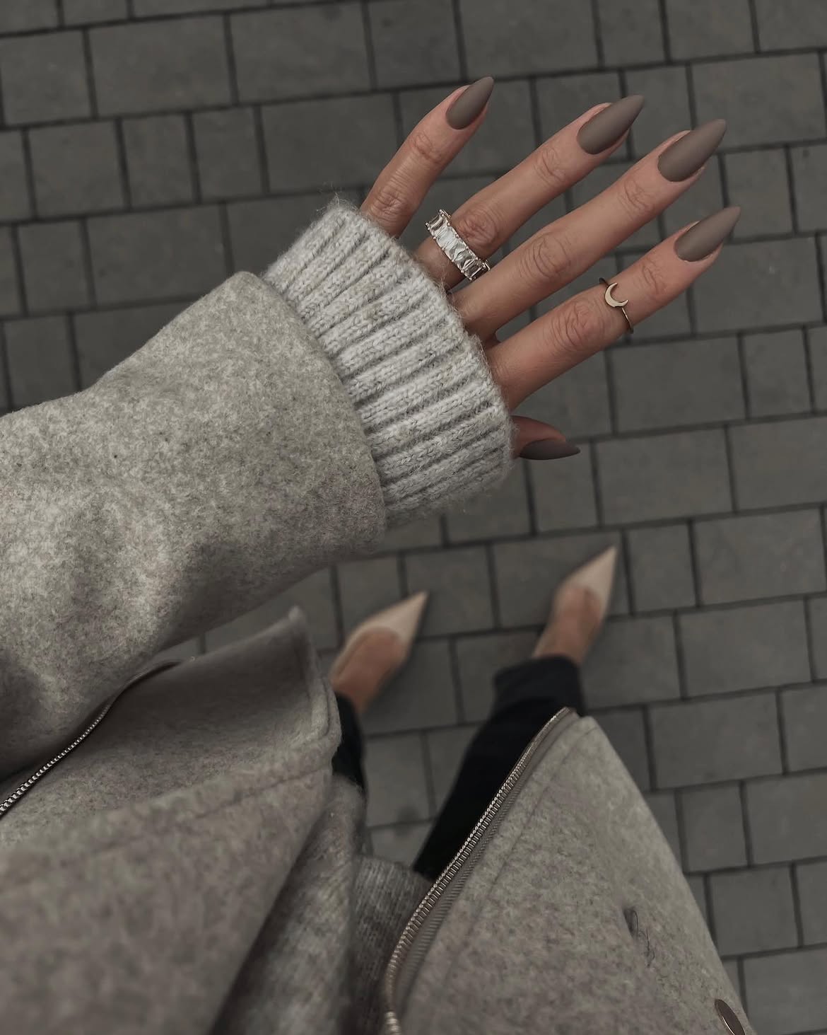 Matte Taupe Stiletto Nails with Minimalist Rings