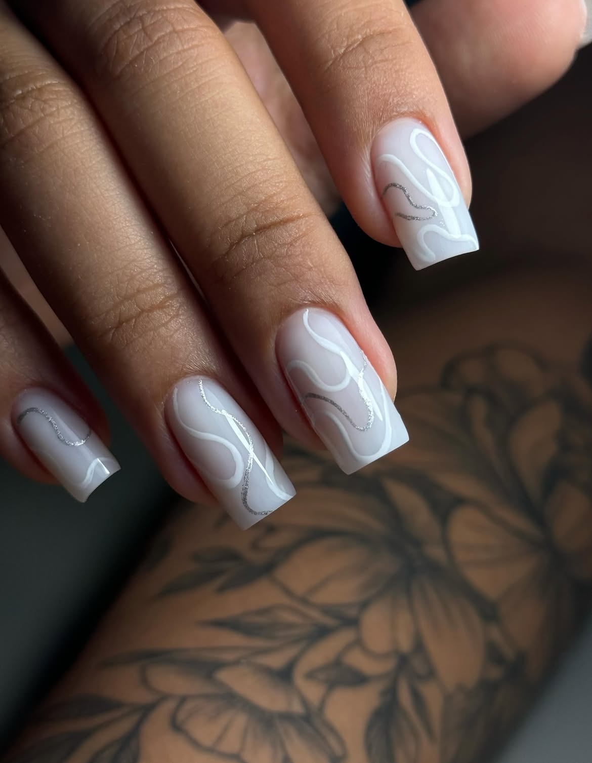 Milky White Abstract Flame Swirl Nails