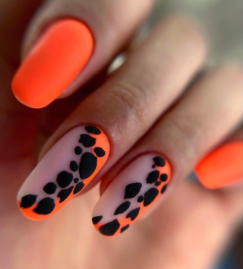 Neon Orange Matte and Animal Print Accent Nails
