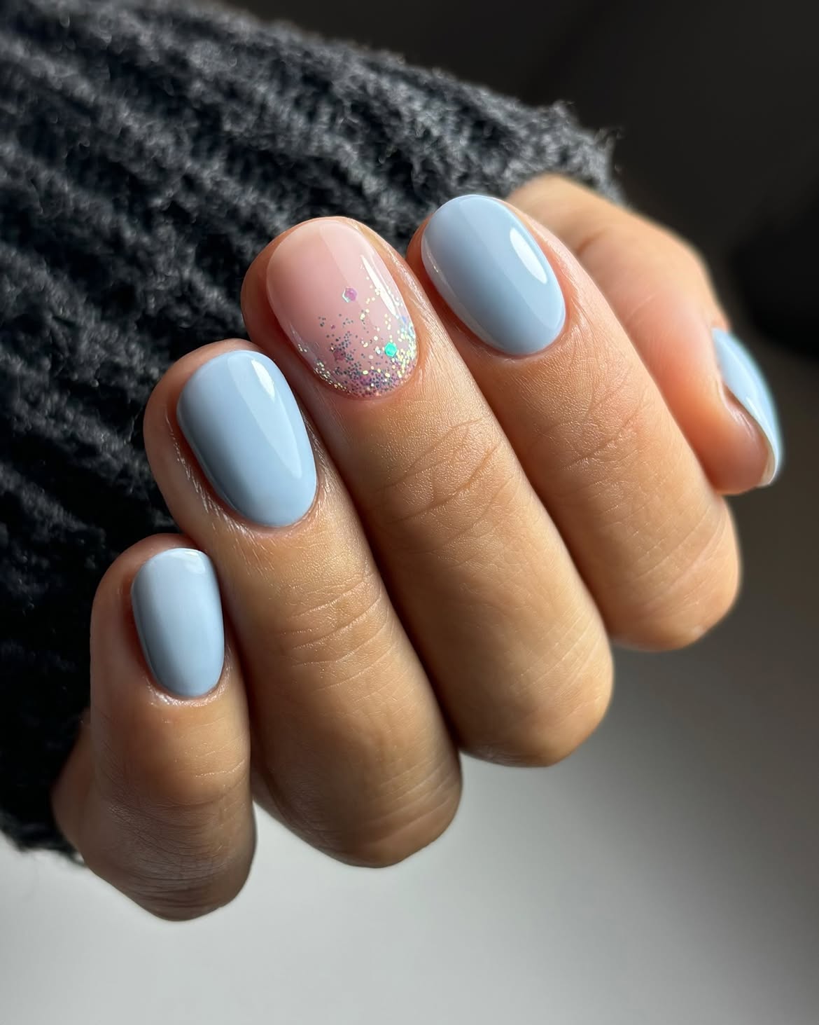 Pastel Blue Oval Nails with Glitter Accent