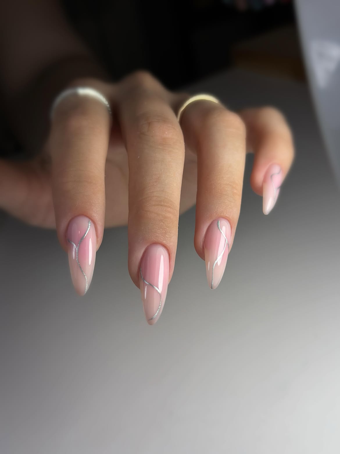 Sheer Pink Almond Nails with Silver Swirl Art