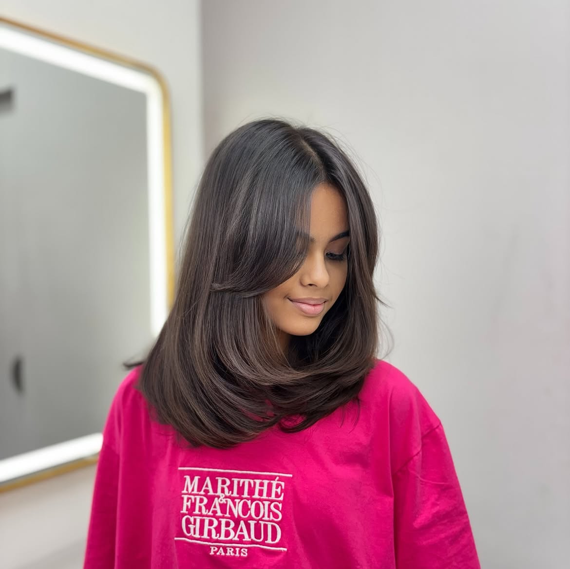 Soft Face-Framing Layers With Dark Chocolate Hair