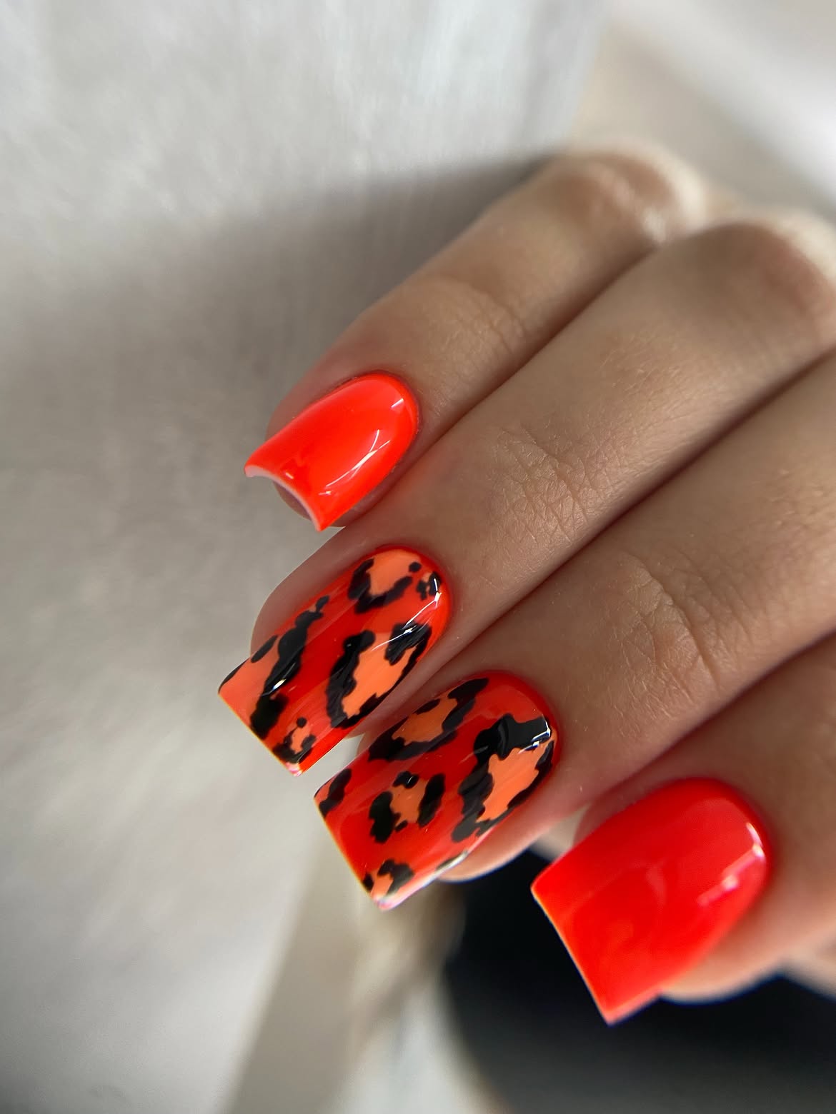 Striking Neon Orange Leopard Print Nails