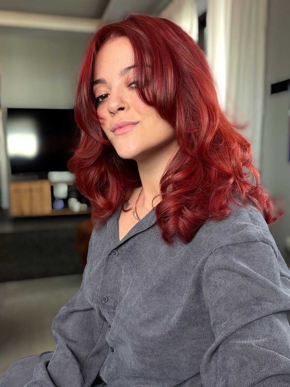 Vibrant Cherry Red Waves With Face Framing Layers
