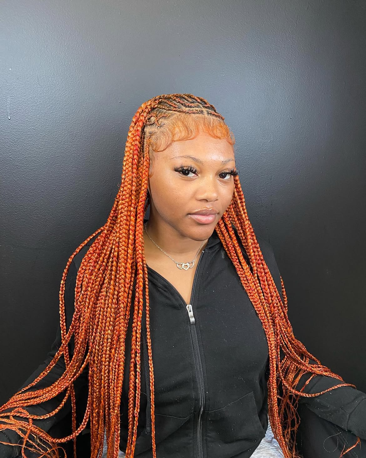 Vibrant Orange Box Braids With Wispy Baby Hairs