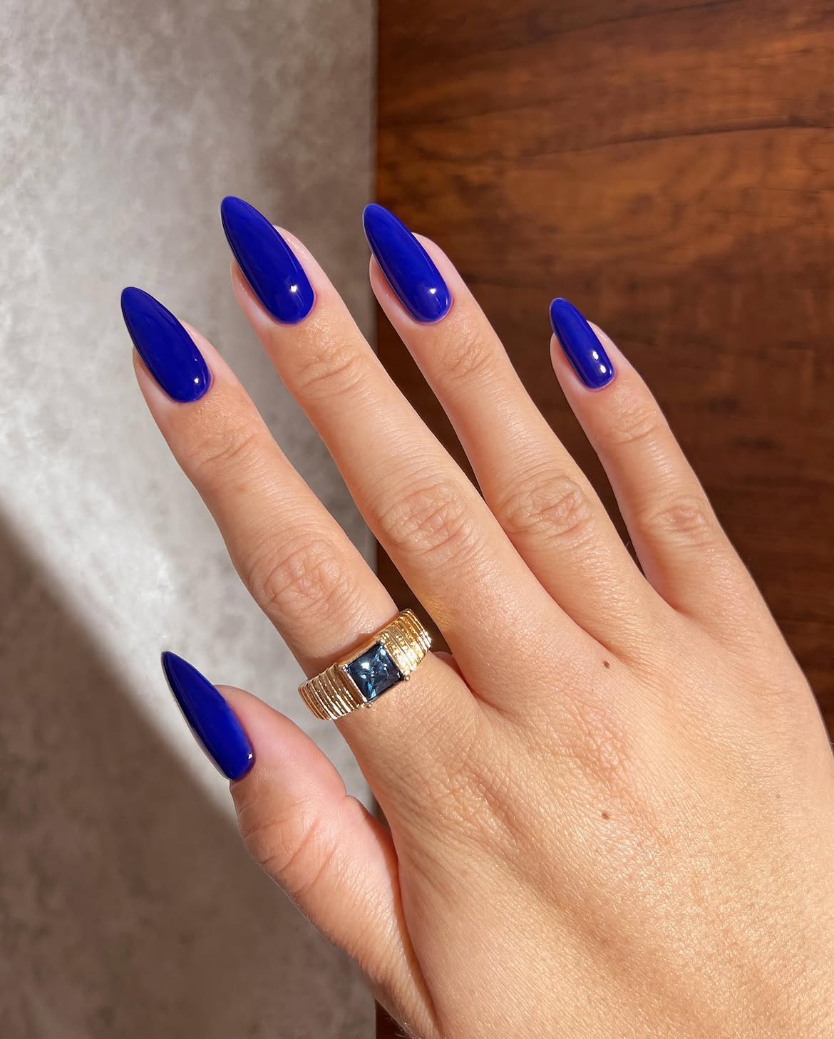 Vibrant Royal Blue Almond Glossy Nails