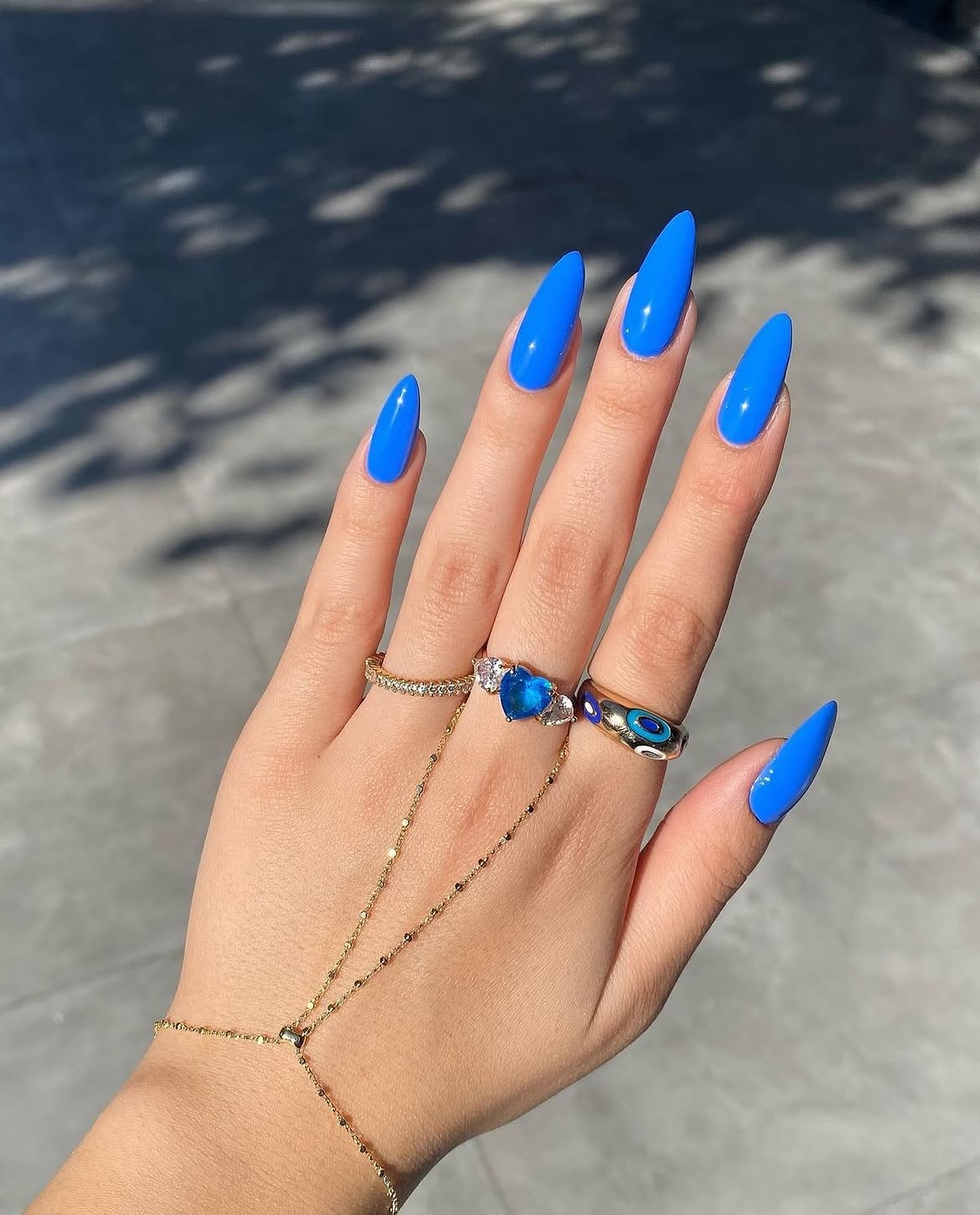 Vivid Blue Stiletto Nails With Glossy Finish