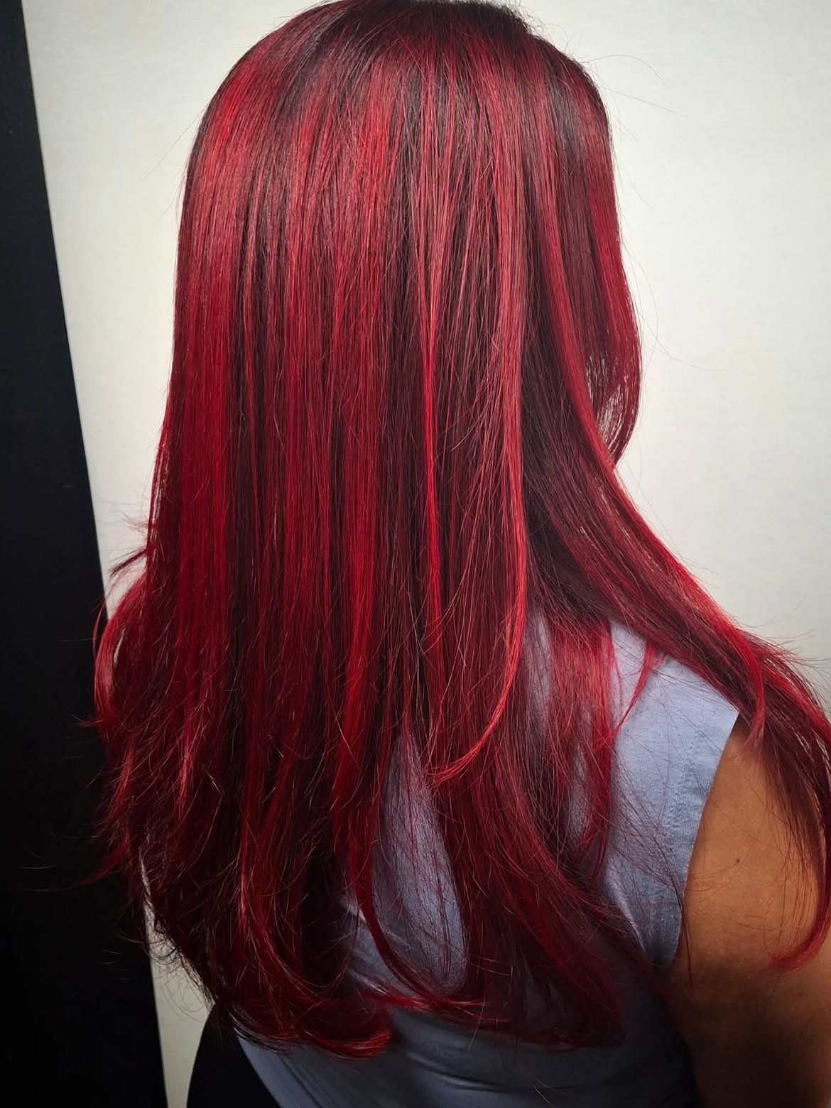 Vivid Cherry Red Hair With Deep Burgundy Lowlights
