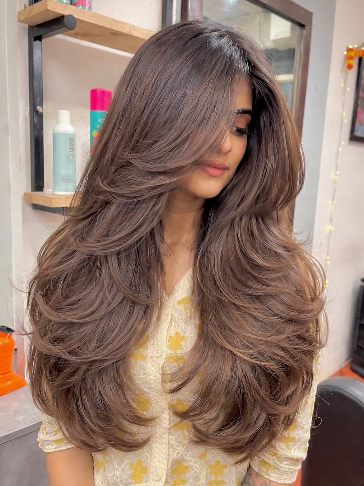 Voluminous Layered Cut With Face-Framing Bangs